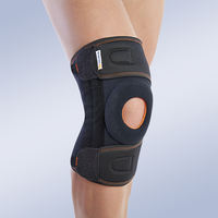 Ортез коленного сустава 6119/7119 ORLIMAN разъемный, 2я пластинами , силиконовым кольцом, универ.